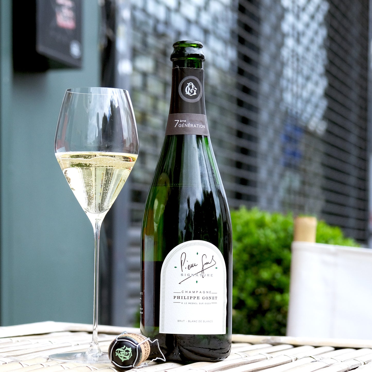 Philippe Gonet Signature Blanc de Blancs Brut Bottle and Wine in Sparkling Glass