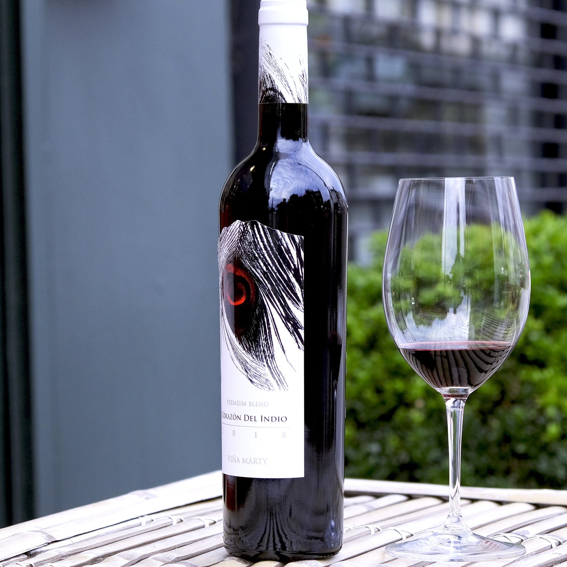 Corazon del Indio Cabernet Sauvignon Blend Chile In Glass on Wooden Table Outside