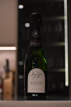 Philippe Gonet Blanc de Blancs in a modern kitchen in the evening